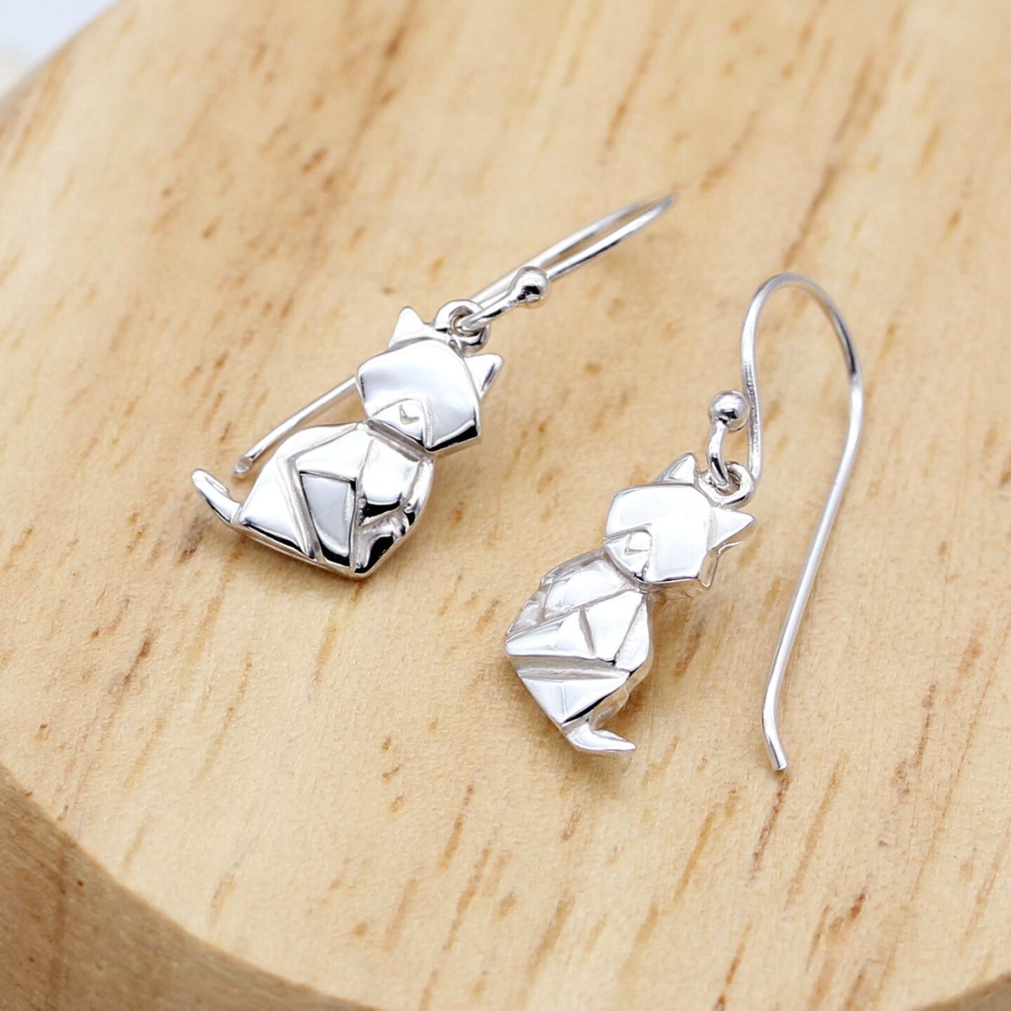 Talk about a statement piece! These cat earrings are one of the most unique accessories you can wear. They are the perfect jewelry gift for a cat-lover or for yourself! #catmom #catearrings #jewelry