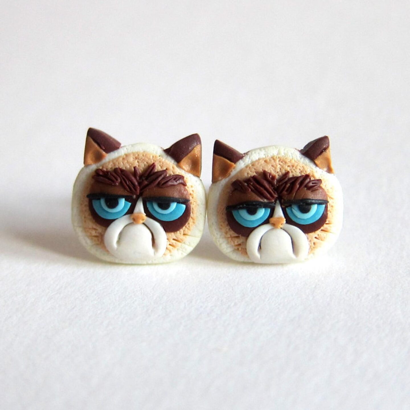 Talk about a statement piece! These cat earrings are one of the most unique accessories you can wear. They are the perfect jewelry gift for a cat-lover or for yourself! #catmom #catearrings #jewelry