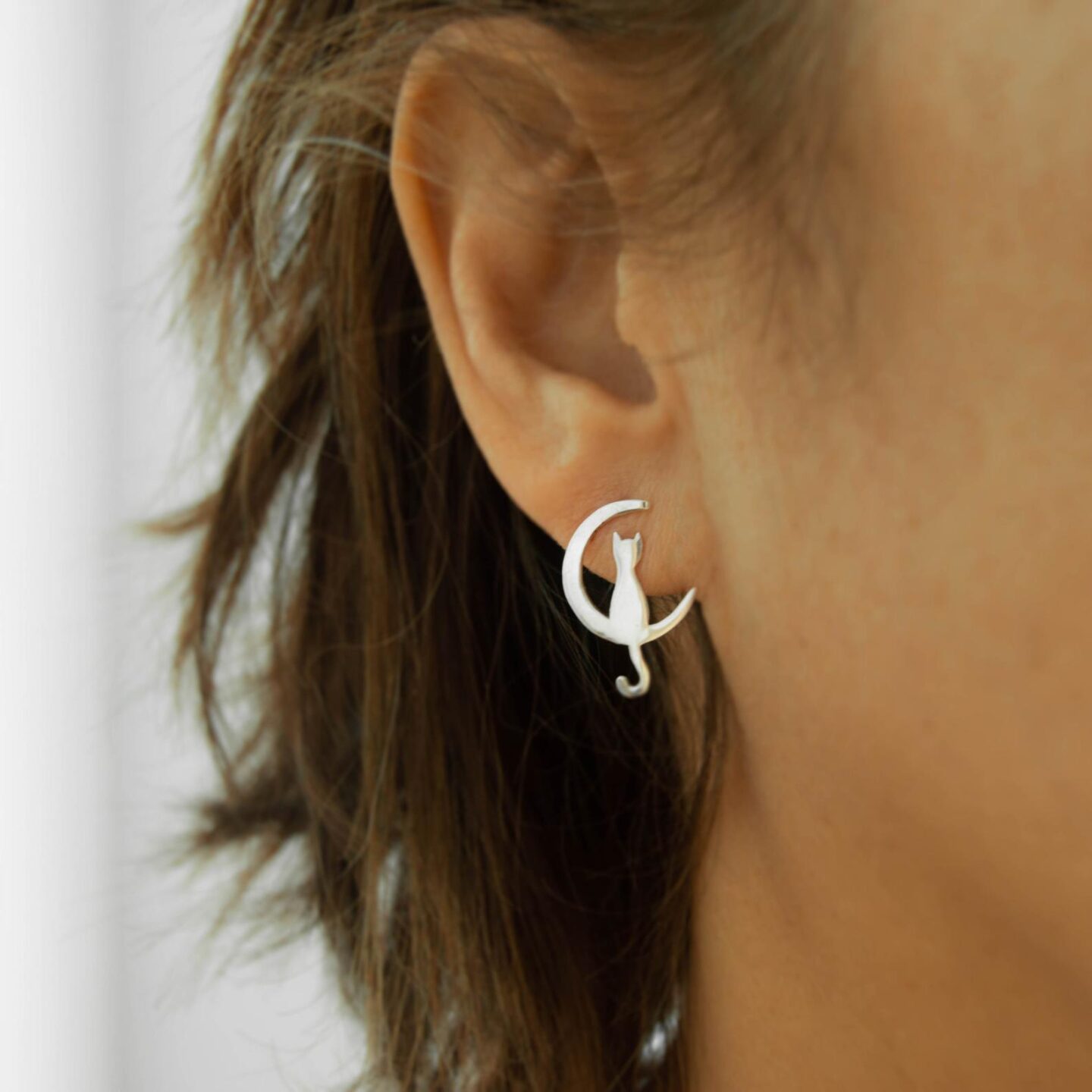 Talk about a statement piece! These cat earrings are one of the most unique accessories you can wear. They are the perfect jewelry gift for a cat-lover or for yourself! #catmom #catearrings #jewelry