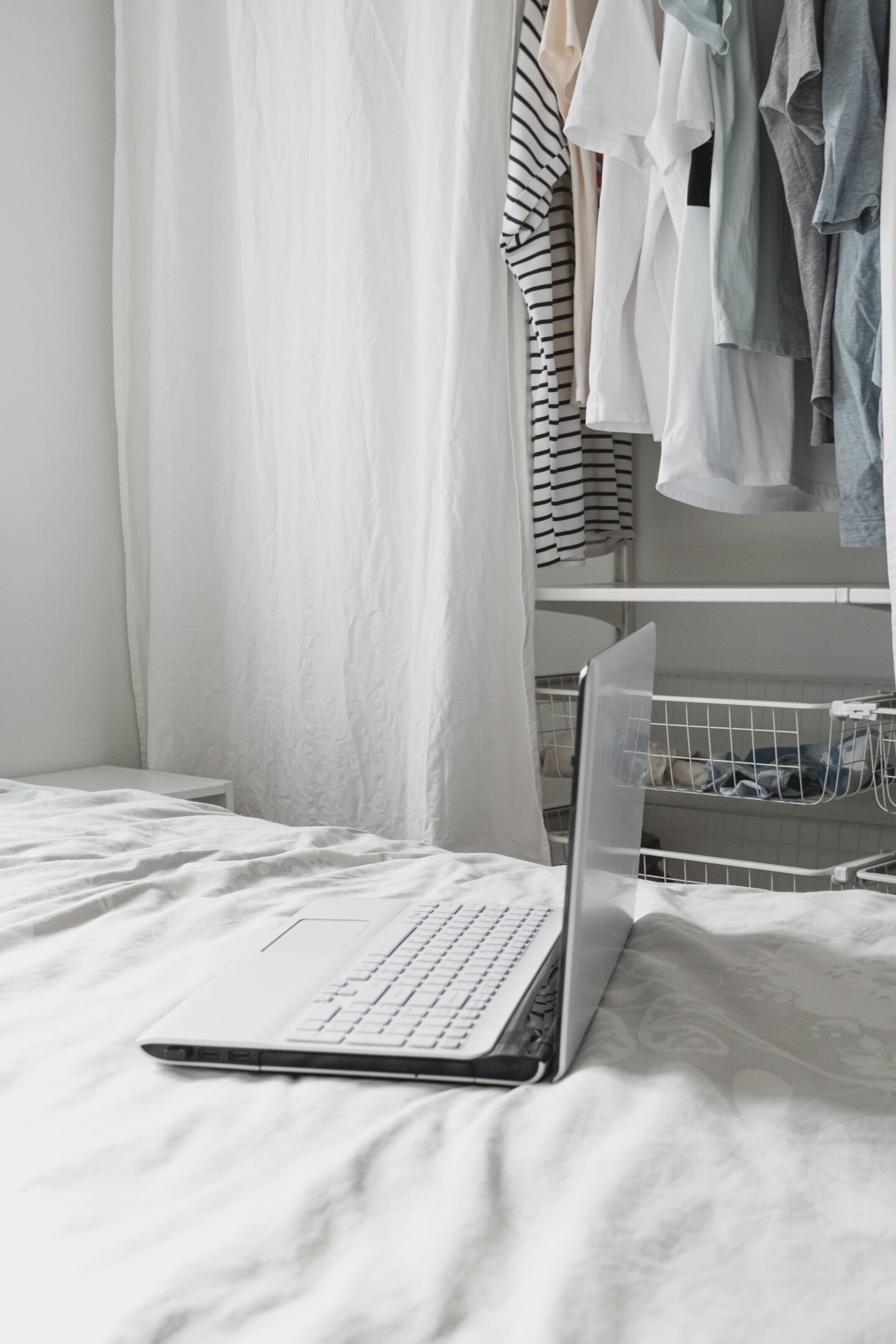 Use a hanging clothes rack as a simple and function decor for your bedroom. Looks stylish and minimalistic