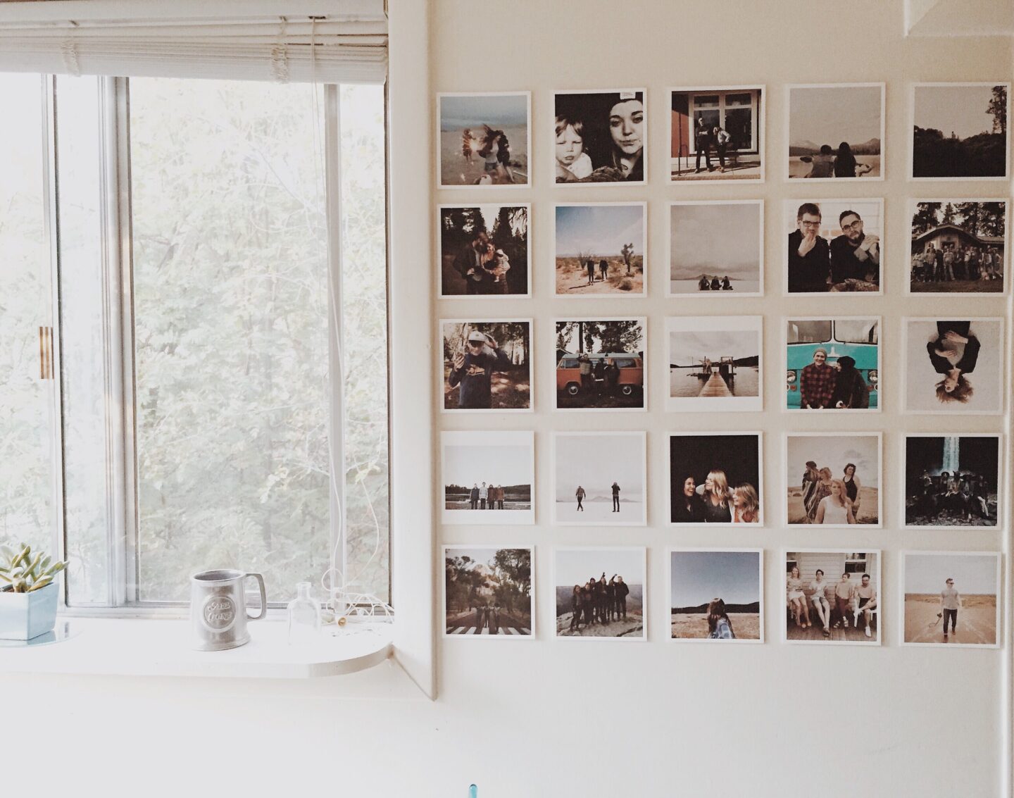 A photo wall is an easy and cheap way to decorate a bedroom